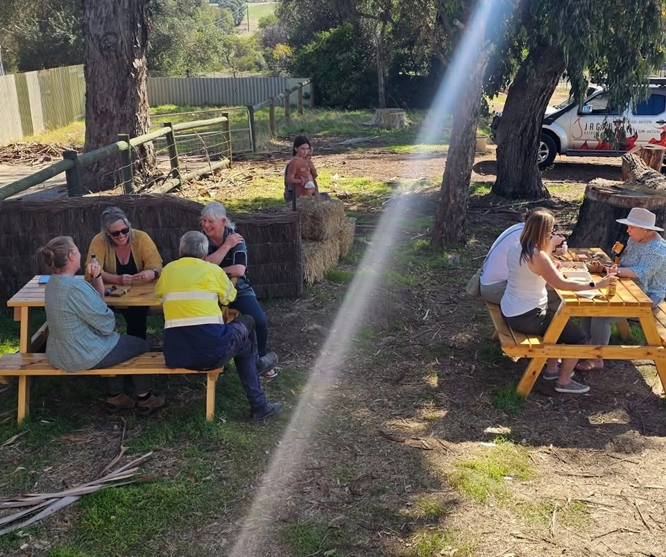 Mrs'Sippy BBQ crowd gathered at an outdoor public event